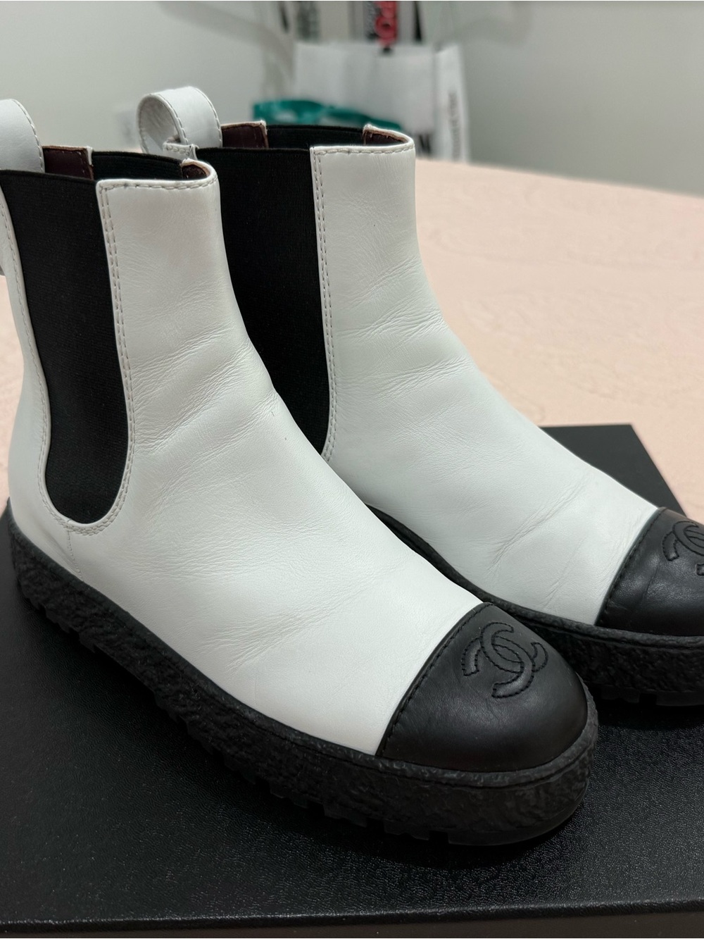 CHANEL White Leather Chelsea Ankle Boots with Black Toe Cap